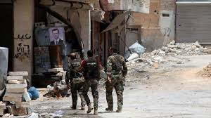 Soldados sirios en el Alepo liberado. /Foto: hispantv.com.